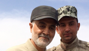 Iranian Revolutionary Guard Commander Soleimani stands at the frontline during offensive operations against Islamic State militants in the town of Tal Ksaiba in Salahuddin province