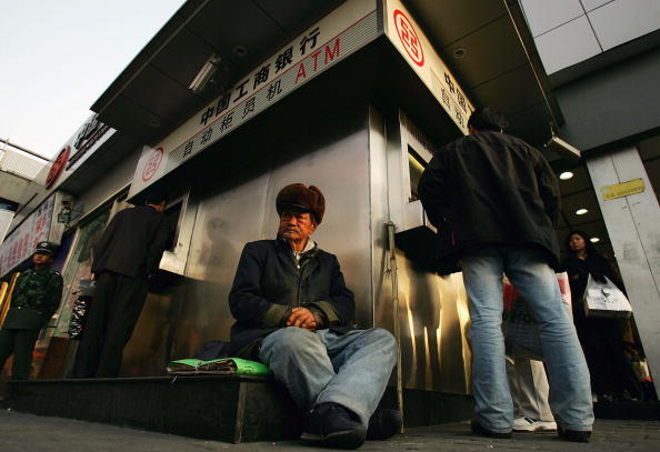 Beggar Wait For Aloms In Beijing