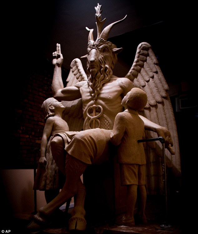 2ADE2F8500000578-0-This_photo_shows_the_bronze_monument_featuring_Satan_with_horns_-m-29_1437954789549