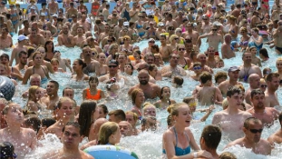 Budapest residents seek refuge from heat wave in baths, water parks