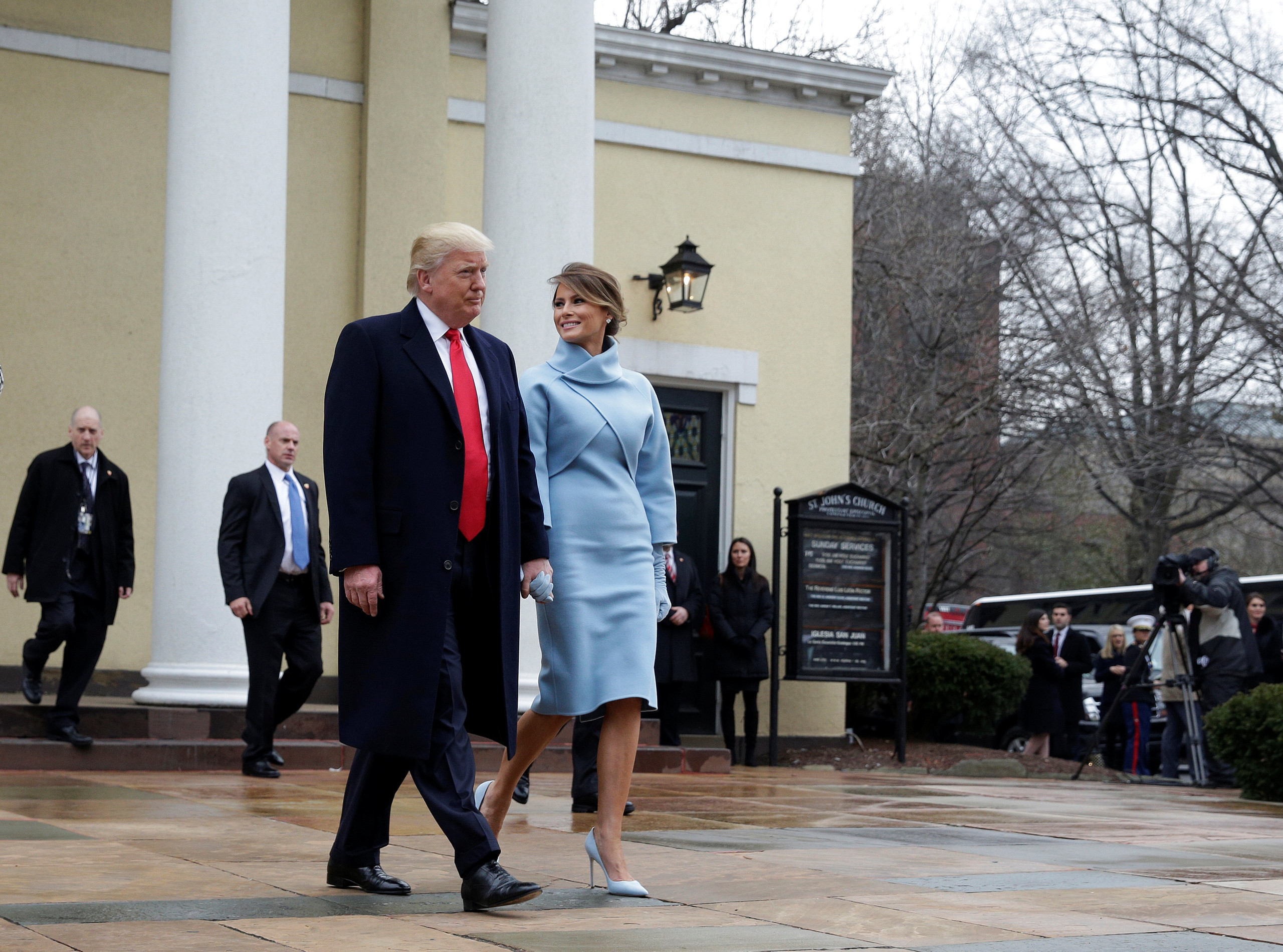 President-elect Donald Trump and his wife Melania depart from services at St. John's Church during his inauguration in Washington.